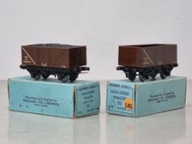 Two boxed Hornby Dublo pre-war L.M.S. High-sided Wagons, one with coal. Both near mint with no