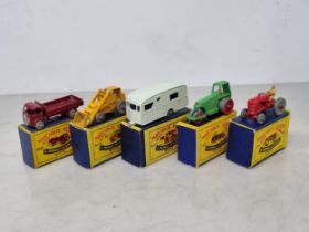 Five boxed Lesney Matchbox Models including No.1 Roller, No.4 Tractor, No.20 Lorry, No.23 Caravan