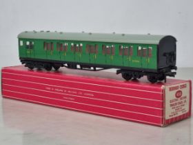 A boxed Hornby Dublo 4150 S.R. Trailer Coach in mint condition, has been lightly run. Box in near