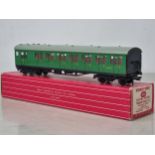 A boxed Hornby Dublo 4150 S.R. Trailer Coach in mint condition, has been lightly run. Box in near