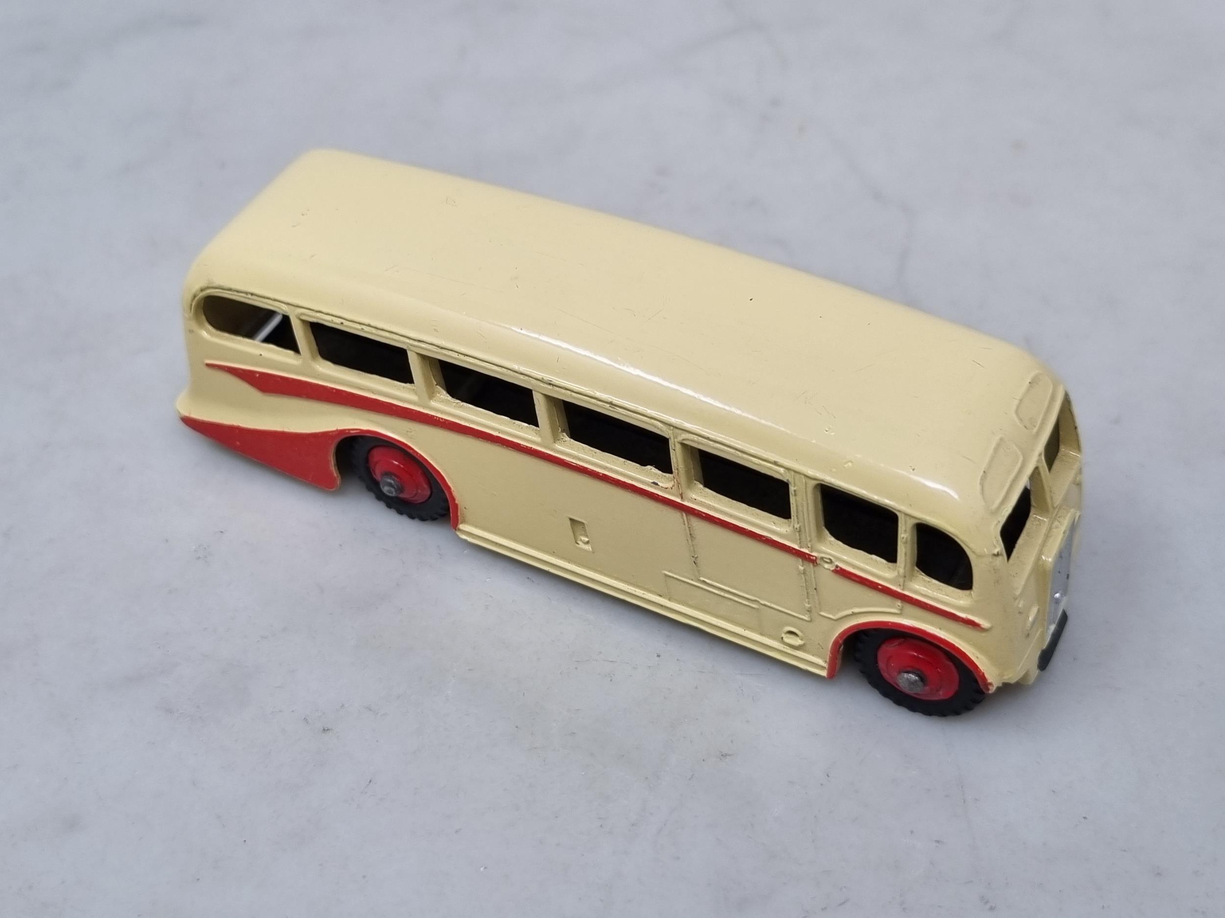 A Dinky Toys 281 Luxury Coach, rarer cream body with red flash and hubs, mint condition, ideal for - Image 2 of 3