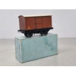 A boxed Hornby Dublo pre-war N.E. Goods Van in near mint condition. Chassis and wheels show no