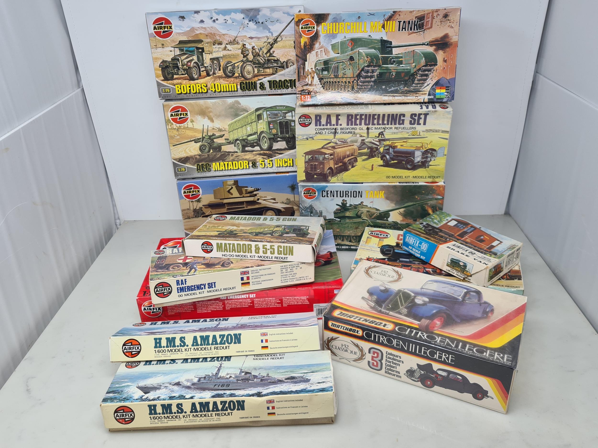 Twenty two boxed Airfix, Revell and Matchbox plastic Kits of Ships and Vehicles