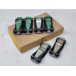 A Dinky Toys Trade Box 36F British Salmson 4 seater containing six cars, all Nr M-M,, 3x green, 2x