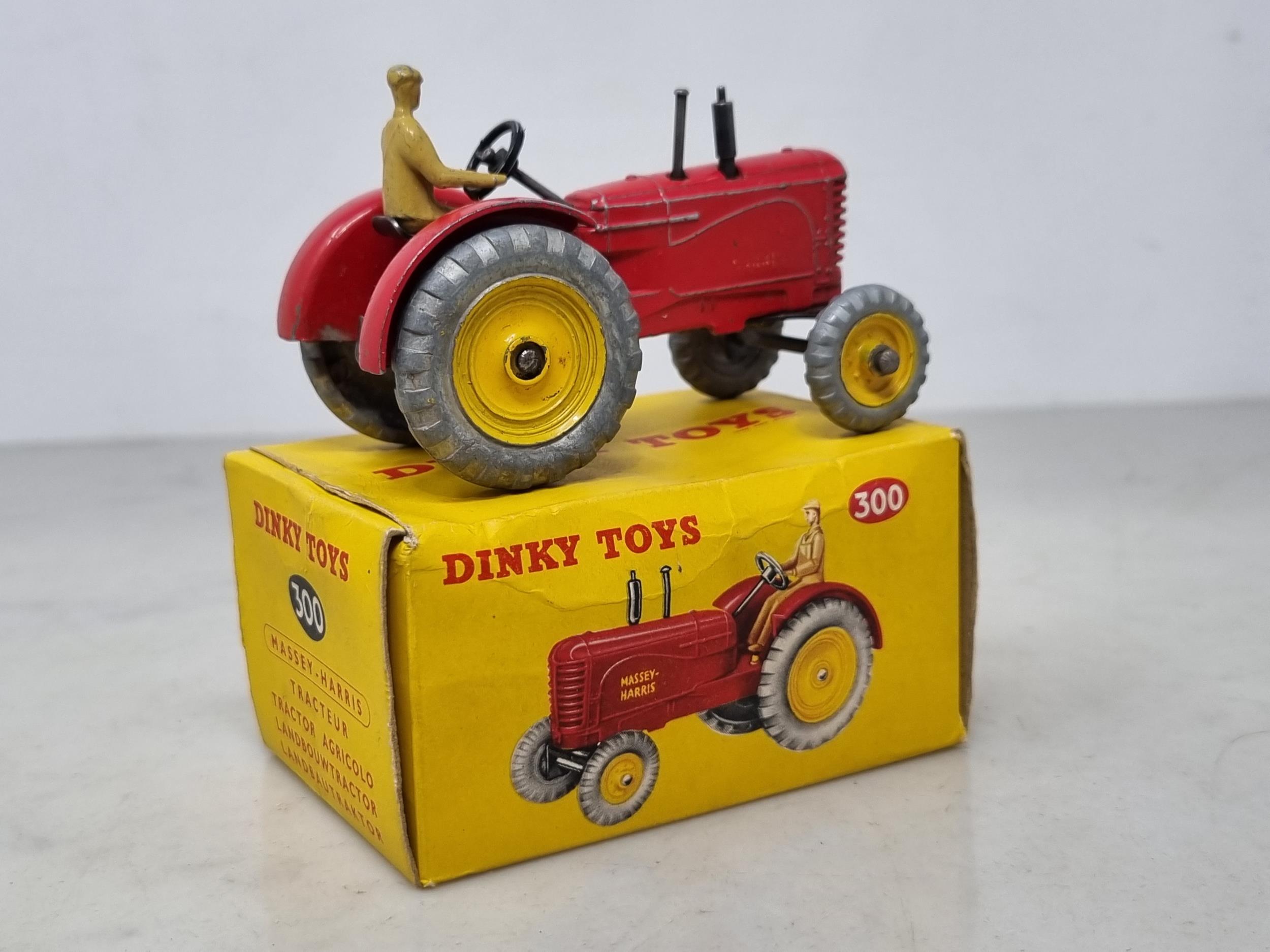 A boxed Dinky Toys No.300 Massey-Harris Tractor, G (transfers heavily worn), box Ex - Image 3 of 3