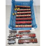 Nine unboxed Hornby Dublo Coaches, four Flat-bed Wagons, a Brick Wagon and a Mineral Wagon