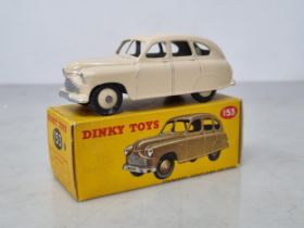 A boxed Dinky Toys No.153 cream Standard Vanguard Saloon, Nr M-M, box Ex