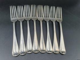 Eight George III silver Dinner Forks old english pattern engraved crests and initials, London 1807/