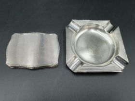 A George V continental silver Snuff Box of serpentine form with engine turning, import mark London