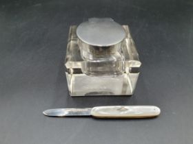 An Edward VII silver mounted square glass Inkwell, London 1907, marked ASPREY, and a Fruit Knife