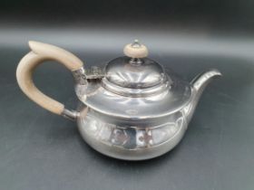 A George V silver Teapot of compressed circular form, Birmingham 1922, maker: Adie Bros, 440gms