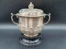 A George V silver two handled Porringer and Cover with leafage embossed and chased friezes, caryatid