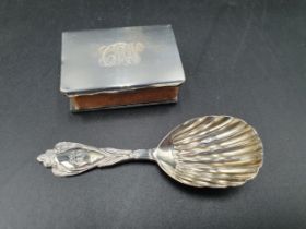 A Victorian silver Caddy Spoon with shell bowl and ornate stem engraved initials, London 1868, and a