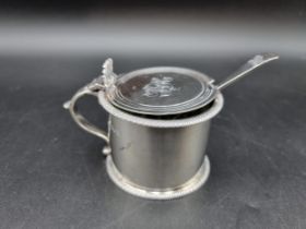 An Edward VII silver Drum Mustard Pot with gadroon rim, clear glass liner, London 1908, and a Spoon,