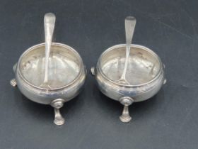 A pair of George II silver Cauldron Salts engraved initials G over I * M on hoof feet, London 1752