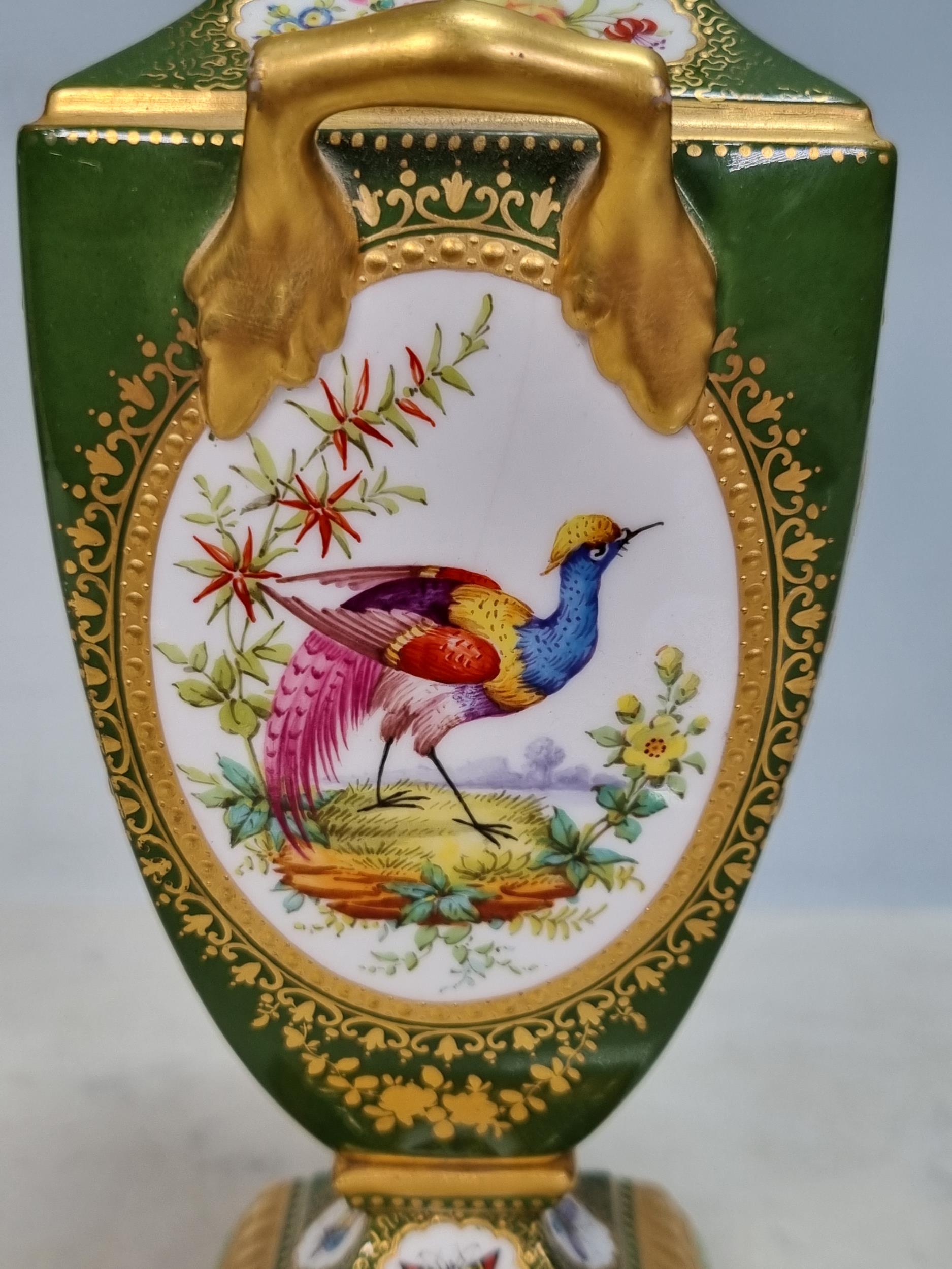 A Coalport type twin handled Vase and Cover in green and gilt glaze, decorated with panels of - Image 6 of 9