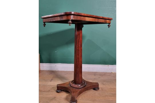 A 19th Century rosewood Occasional Table with rounded rectangular top on octagonal column and - Image 2 of 3