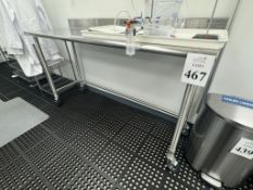 STAINLESS STEEL 6' TABLE ON CASTERS