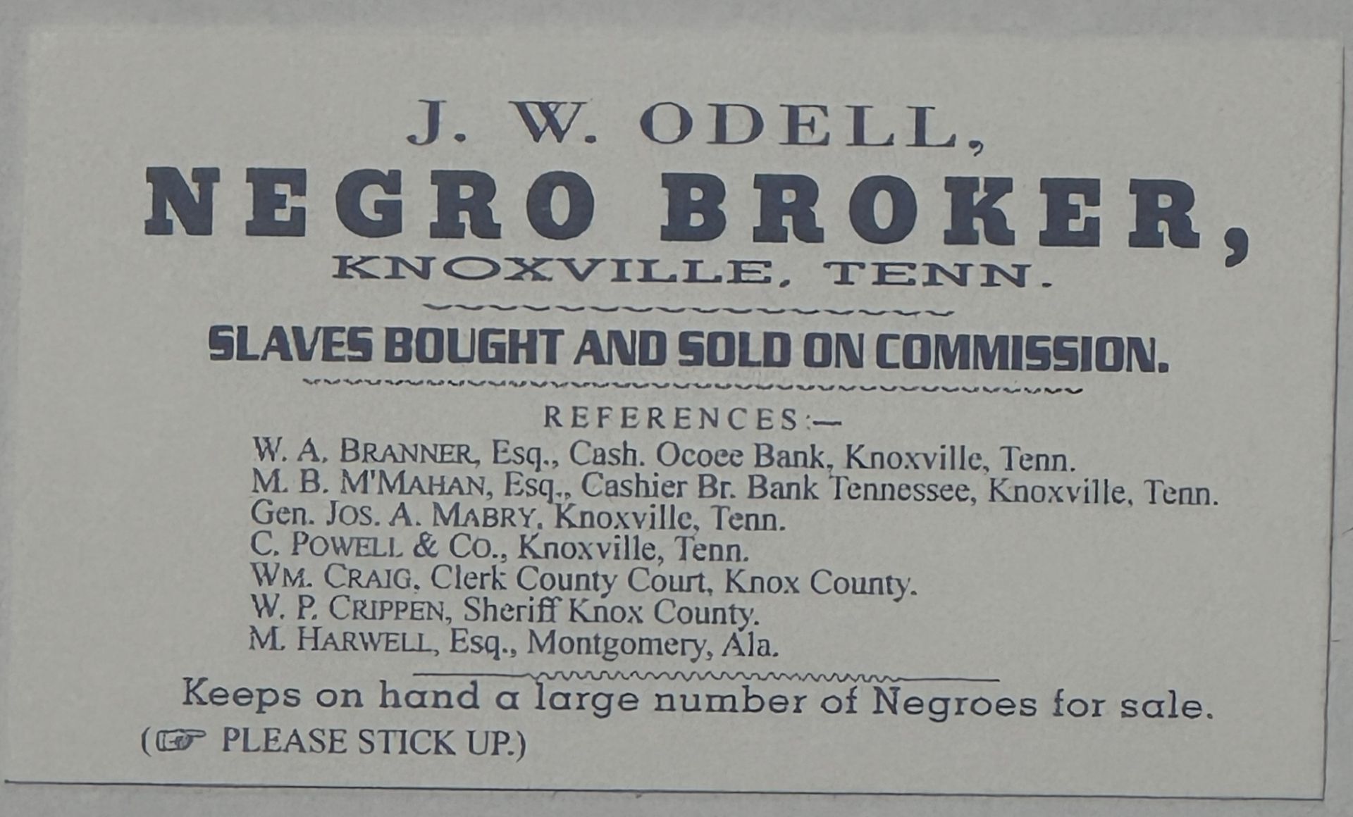 J.W Odell Negro Broker business card