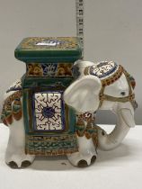 A small oriental ceramic elephant form plant stand