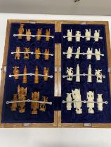 A wooden cased chess set