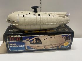 A boxed Star Wars Return of the Jedi rebel transporter