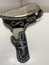 A reproduction western style gun belt