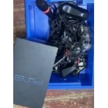 A PS2 console and accessories