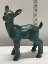 A period pottery lamb