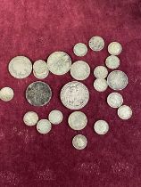 A job lot of assorted British and world silver coins