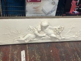 A large framed plaster Cherub themed wall plaque. Shipping unavailable