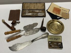 A selection of mixed collectables including pipes and flatware etc