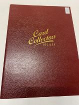 A card collectors society folder full of reprint cigarette cards
