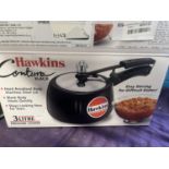 A new boxed Hawkins pressure cooker