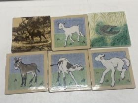 A selection of antique Minton tiles