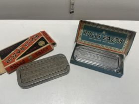 Two boxed rolls razors