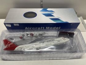 A large boxed model Virgin airliner
