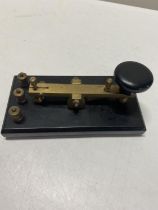 A bakelite Morse code machine