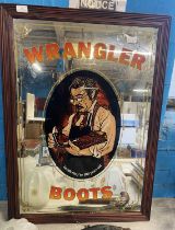A vintage framed advertising mirror for Wrangler Boots. Shipping unavailable