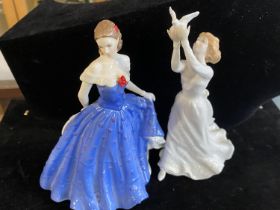 A Royal Doulton figurine and a Royal Worcester figurine