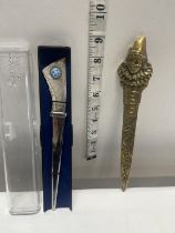 A boxed Caithness paperknife and a vintage brass paperknife
