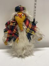 A vintage womble soft toy