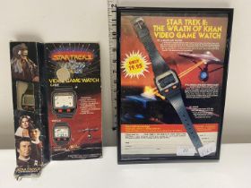 A vintage Star trek 2 videogame watch, boxed with advertising