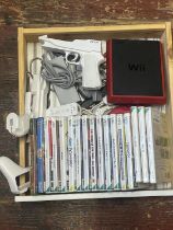 A selection of Wii console, games and accessories