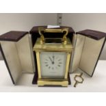 A Taylor and Bligh Carriage Clock boxed with key