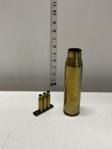 A selection of brass shell cases