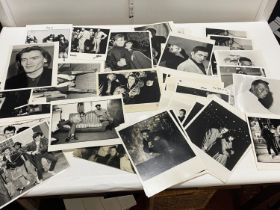 A box full of assorted musical related photographic prints used for Media publicity.