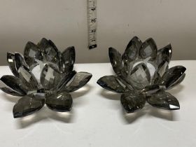 A pair of Julian Mcdonald glass candle holders