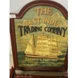 A vintage style wooden sign for The East India Trading Company