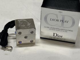 A new boxed Dior extreme shine lip gloss